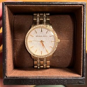 Michael Korak gold watch